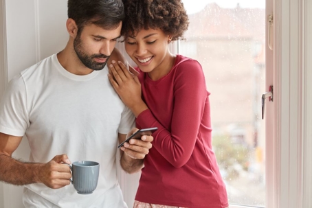 couple looking at phone